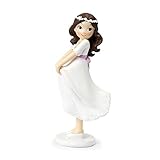 Figura pastel Comunión niña sujetando la falda